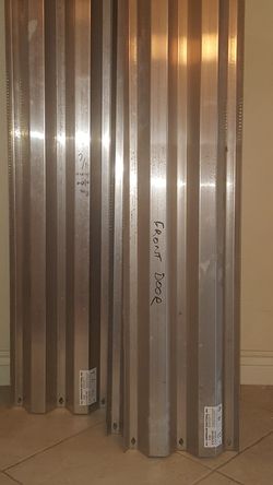 Aluminum hurricane shutters