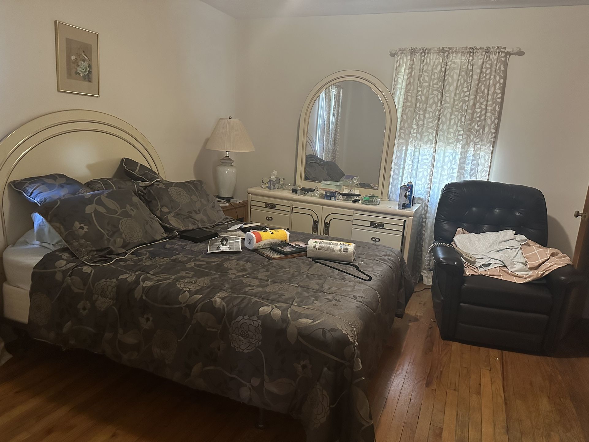 Bedroom bed and a dresser