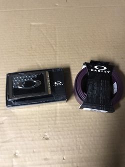 Oakley leather belt and belt buckle.