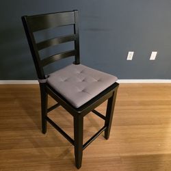 Three (3) Black bar stools with seat cushions