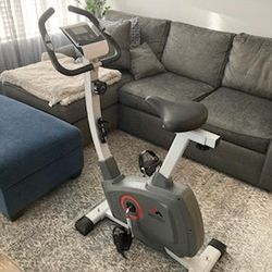 AECOJOY Exercise Bike with Bikeroo Seat Cushion