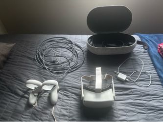 Meta Quest 2 Virtual Headset, 2 touch controllers, and Protective carrying case