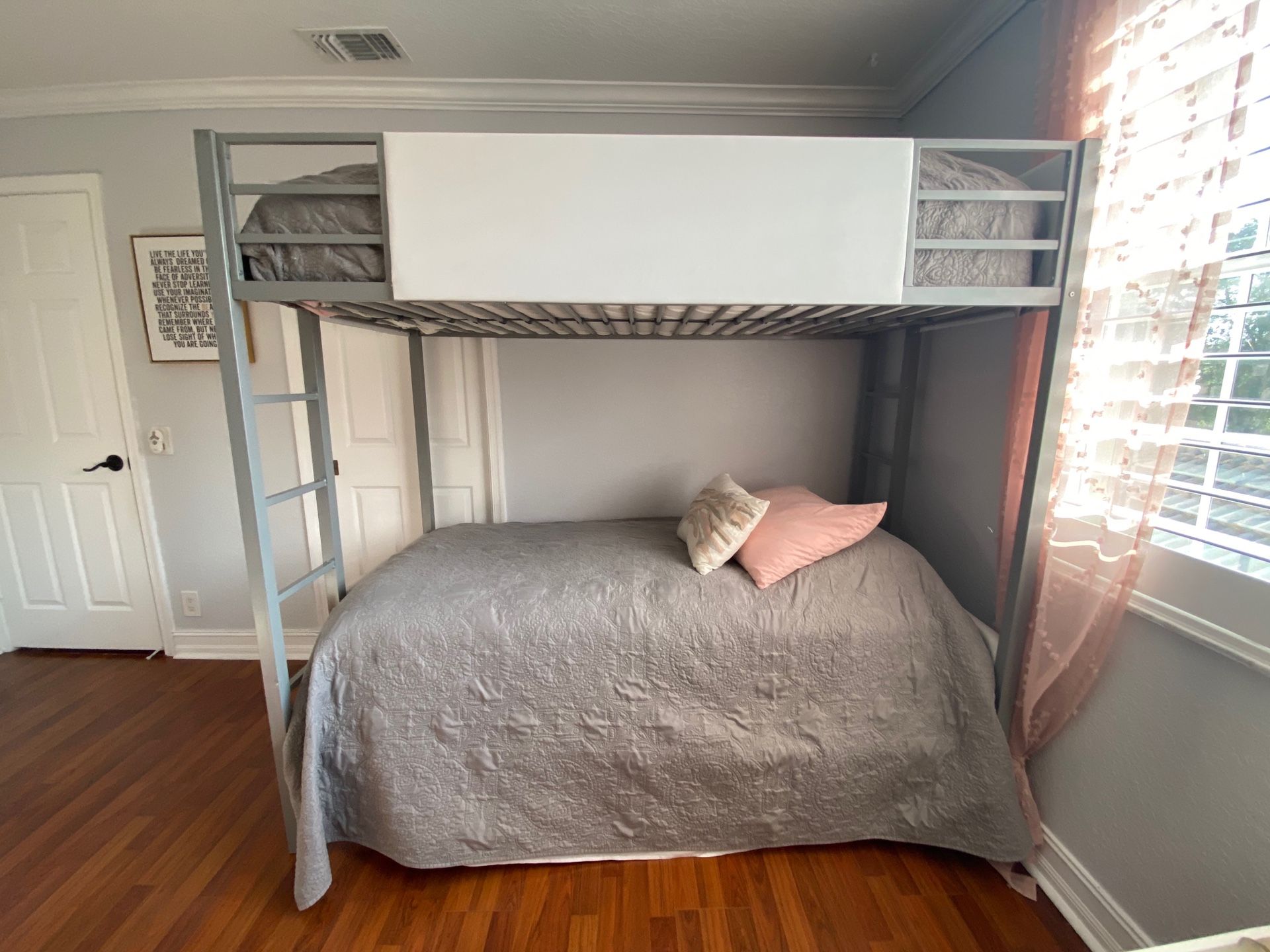 Silver and white metal bunk bed