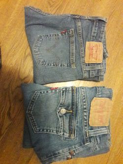 2 pairs of Levis (size 1)