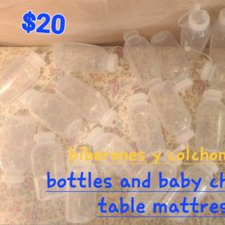 Baby Bottles And Changing Table Mat