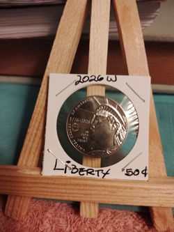 1(contact info removed) W Liberty Half Dollar w/09-11-01/Never Forget Privy