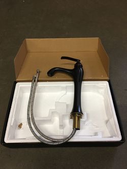 New in Box $25 oil rubbed bronze color single handle bathroom vessel faucet