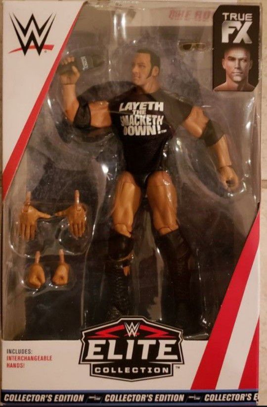 New WWE Elite Collection The Rock Action Figure.