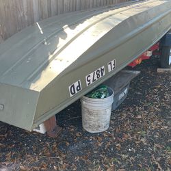 Utility Trailer And Boat Thumbnail