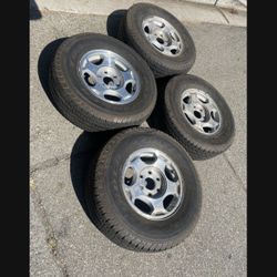 4 - 265/70r16 6x5.5 6x139.7 Chevy Yukon Stock Wheels Rims With Good 80% Treads Tires!!
