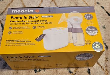 Madela Electric Breast Pump and set of 4 bottles