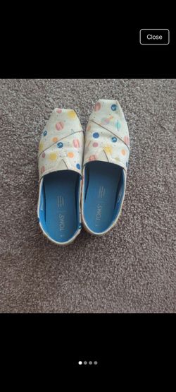 Toms Space Slip Ons