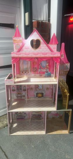 Pink wooden princess doll house