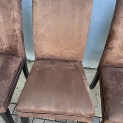 DINNING CHAIRS. BROWN. GOOD CONDITION WOOD FRAME AND FABRIC 