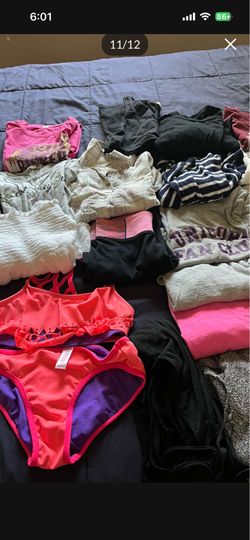 There is 33 pieces of Clothing for girls age 9-12 All of them for $30 total