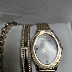 Anne Klein New York Premium Crystal Accented Bangle Women's Watch and Bracelet
