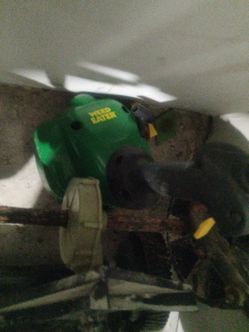 Used lawn mower, weed wacker, edger, and seed feeder for sale.