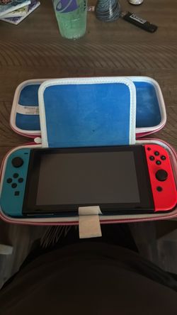 Nintendo Switch with Neon Joy-Cons and Carrying Case