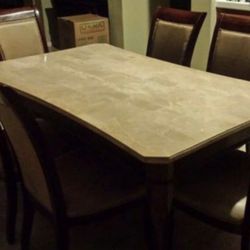 Beautiful table. Marble, light brown. No Chairs