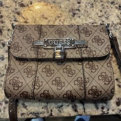 Guess cross body bag. EXCELLENT condition . Never used