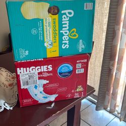 two boxes of diapers size 1 96 count 