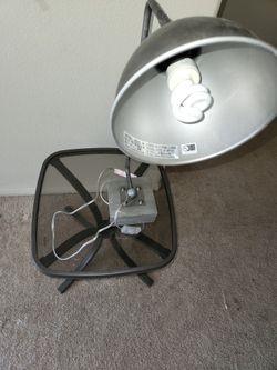 Metal Frame And Glass Table And Lamp