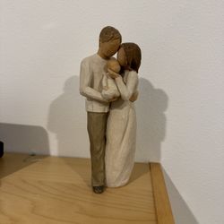 Father, Mother, and Baby Figurine