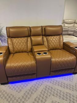 Diamond stitch brown power reclining Sofa w/LED & wireless surround sound