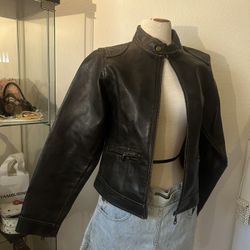 Vintage dark Brown leather jacket with a cool design