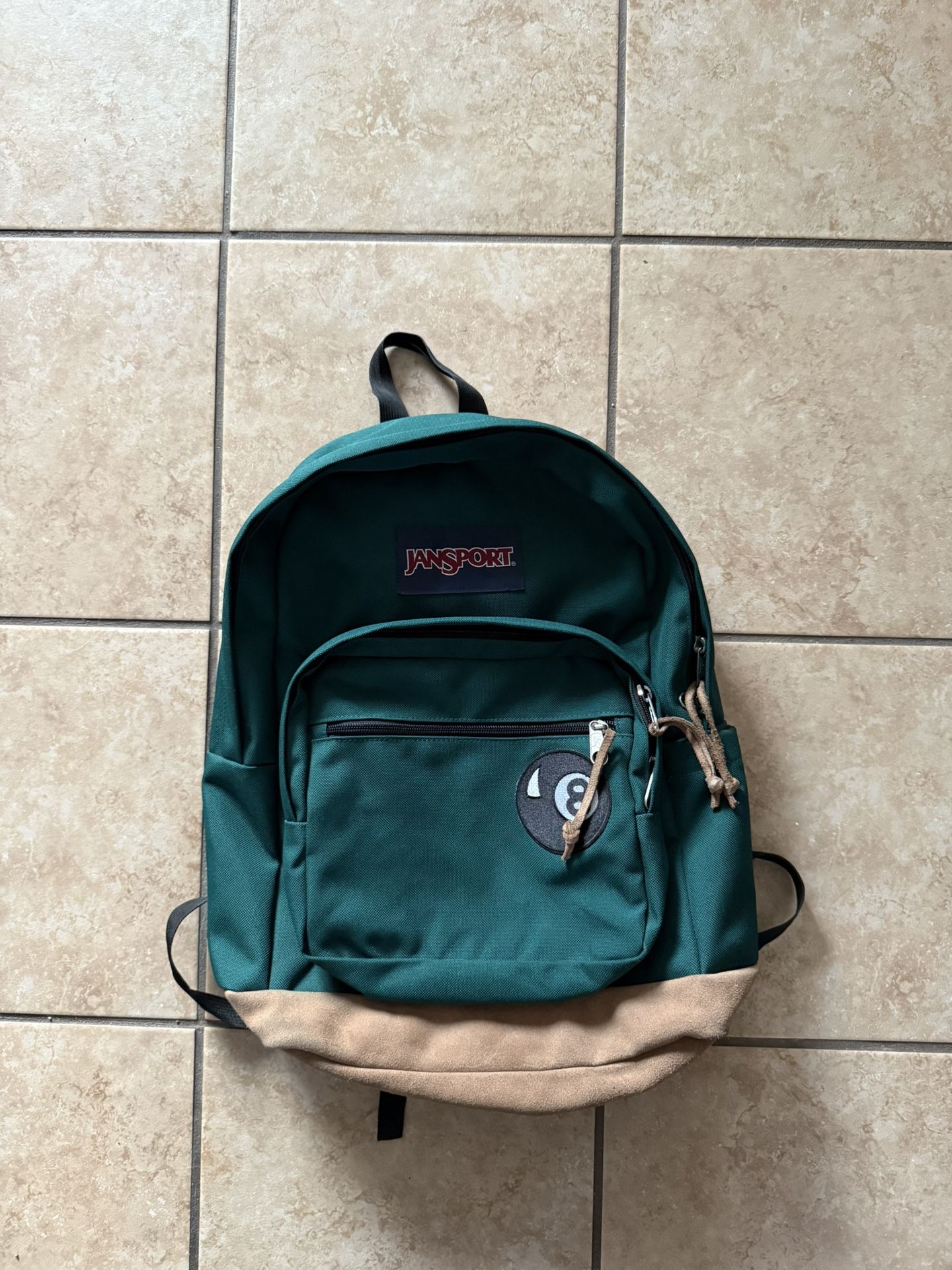Green Jansport Backpack