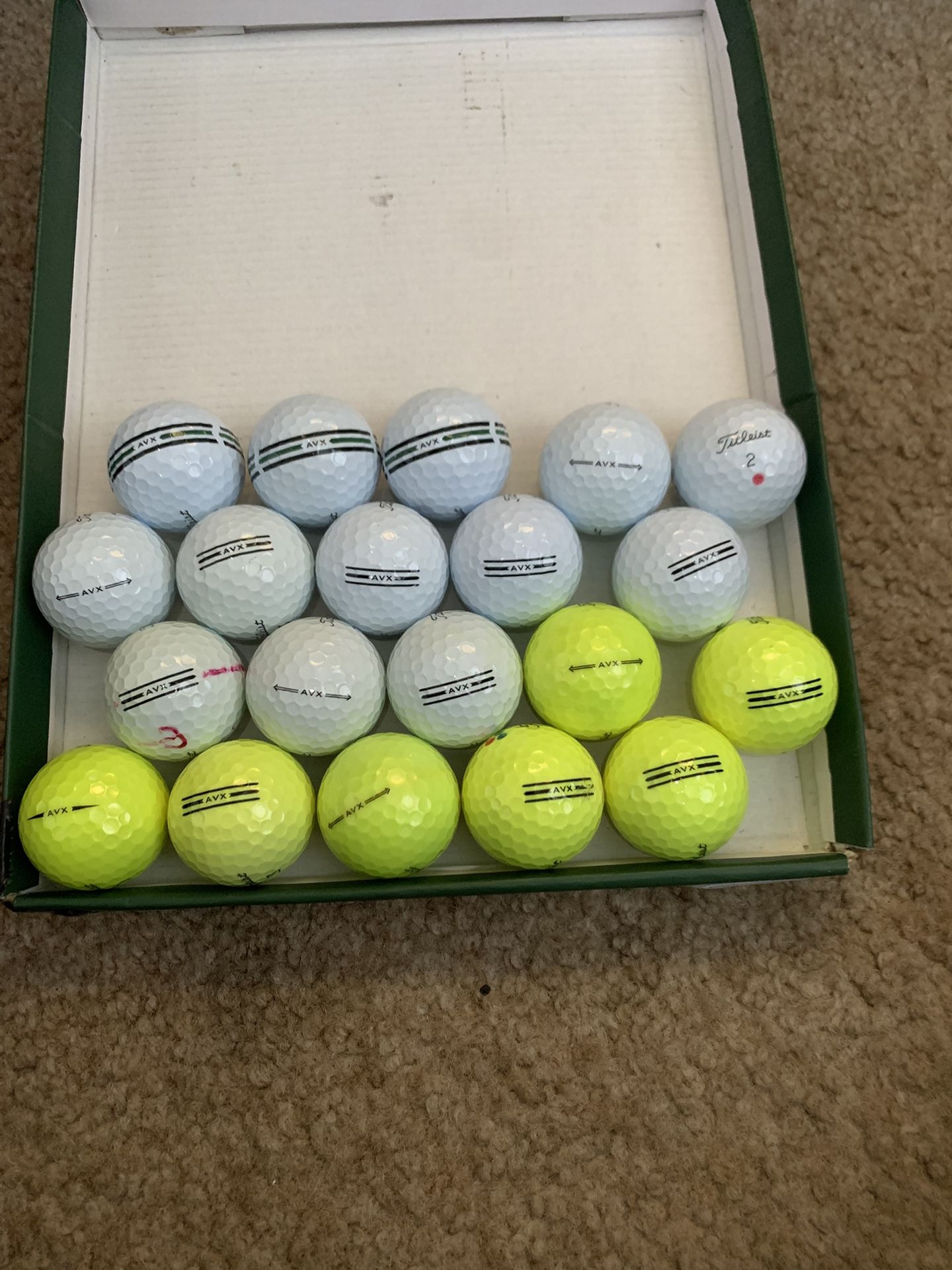20 Golf Balls Titleist AVX In Good Condition.