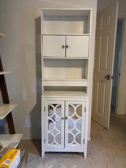 White shelf and mirrored chest/shelf