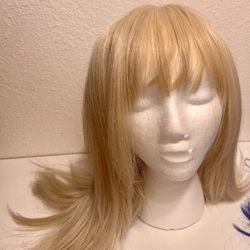 Women’s Wigs and styrofoam wig heads.