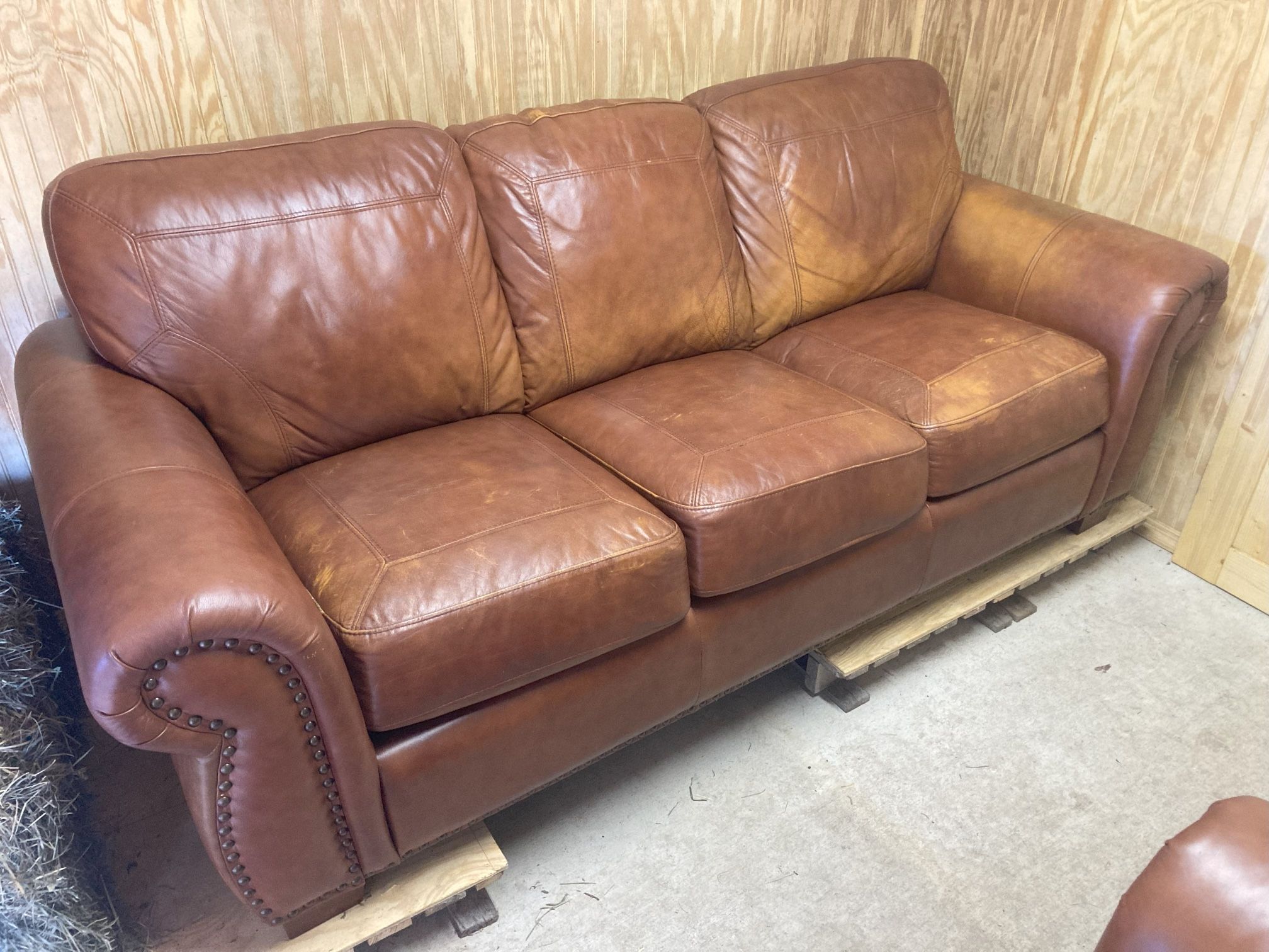 Brown leather sleeper sofa on
