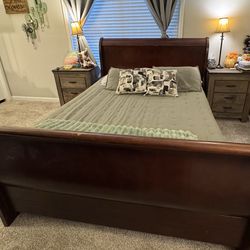 Queen bed frame and 2 night stands.