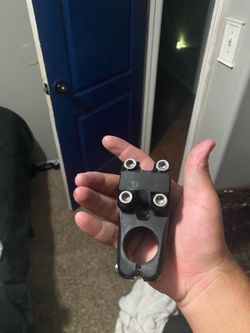 Black stem with bolts