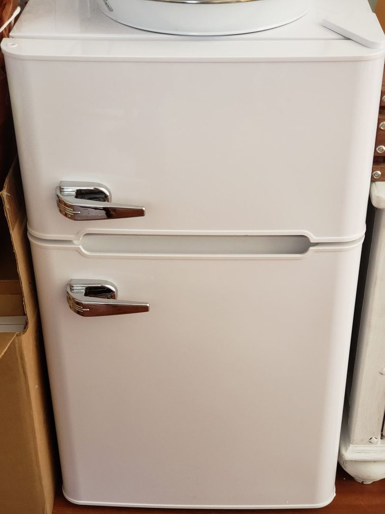 White mini fridge