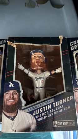 Justin tuner Cody Bellinger bobbles heads