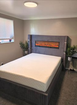 Queen size bed and mattress Fireplace(no heat) and Bluetooth.
