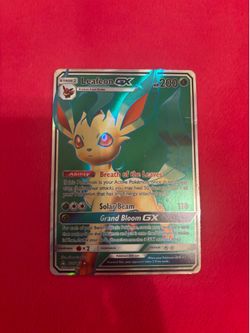 Rare Leafon GX Pokemon card with holographic finish