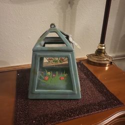 Indoor Or Outdoor Candle Lantern OR A Plant