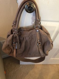 Marc Jacobs purse hobo style shot handles and long taupe in color no major damage just been used!