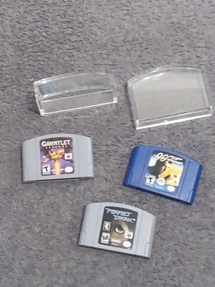 Three N64 Cartridges Lot With Magnetic Perfective Cases 