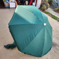 Green beach umbrella