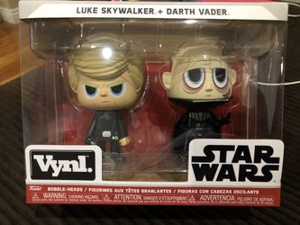 Vynl Star Wars Funko collectibles. Luke + Darth Vader