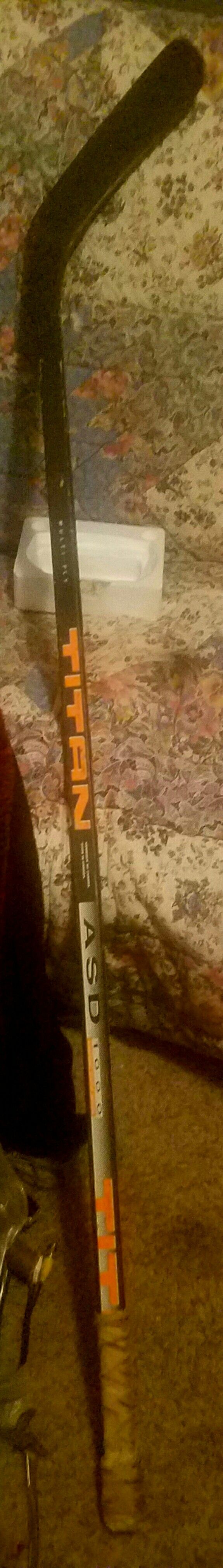 New right hand hockey stick and a Christian hockey stick this one is 6 inches shorter. $16.00 dollars for both