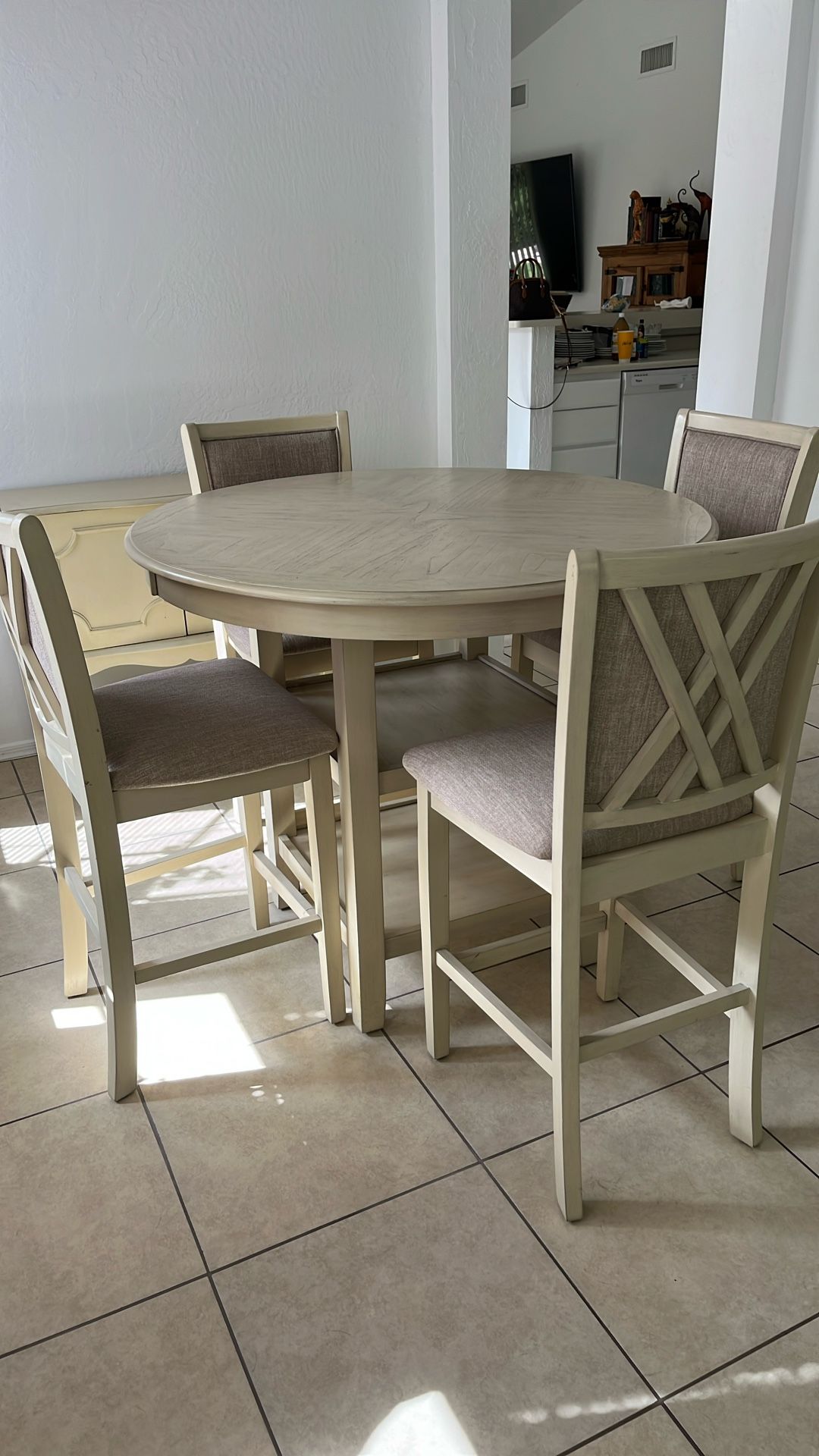 Table and chair set with small cabinet.
