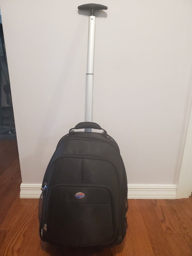 American Tourist Roller Carry On With Telescoping Handle With Backpack Straps Travel Or Computer Bag