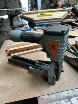 One is pneumatic and other is manual both for $120.00 one box of staples they are for making cardboard boxes stapler.120