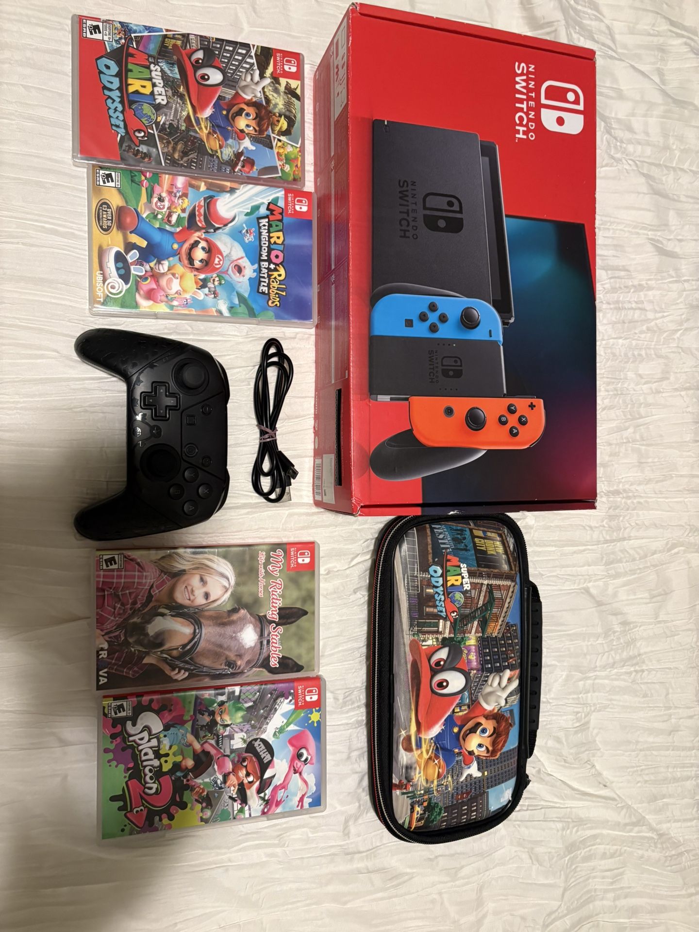 Nintendo Switch + 4 Games (hablo Espanol)